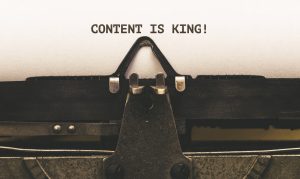 Content is King message on paper in old typewriter